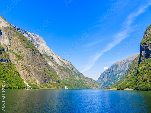Tourism and travel. Mountains and fjord in Norway. © Voyagerix