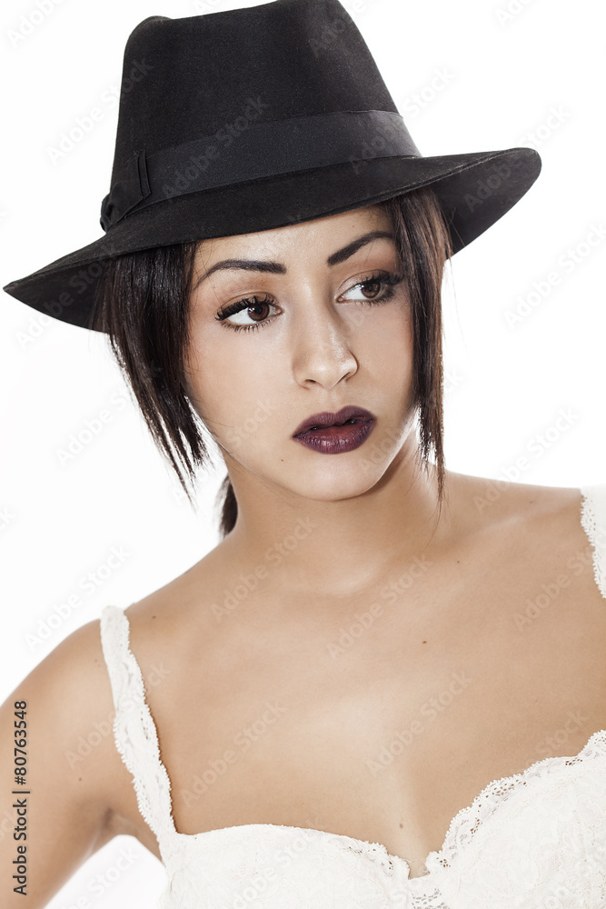 Beautiful woman wearing black hat and white bra Beautiful woman wearing black hat and white bra