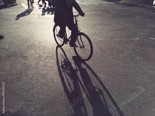 silhouette of bike and long shadow photo