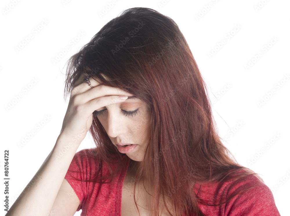 Young Woman with Headache Holding her Forehead Young Woman with Headache Holding her Forehead