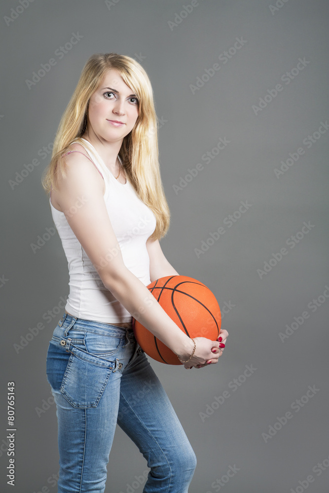 Young and sporty Caucasian Blond Female Posing in Studio With Ba Young and sporty Caucasian Blond Female Posing in Studio With Ba