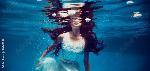 Girl swimming underwater