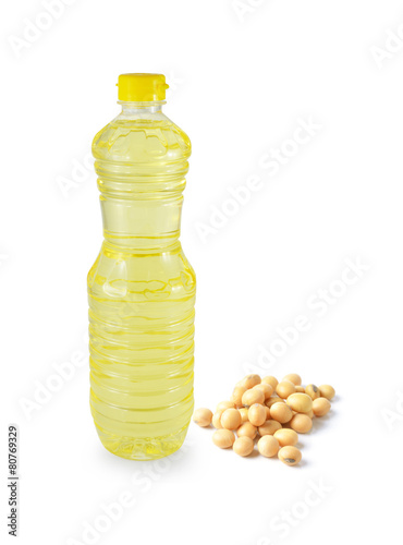 vegetable oil in a plastic bottler on white background photo