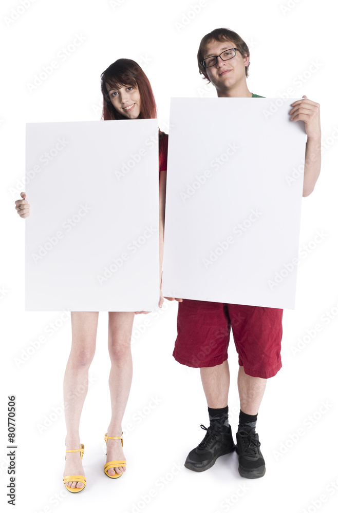 Smiling Young Couple Holding Empty Card Boards Smiling Young Couple Holding Empty Card Boards