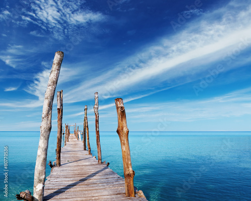 Wooden pier on a tropical island © Dmitry Pichugin