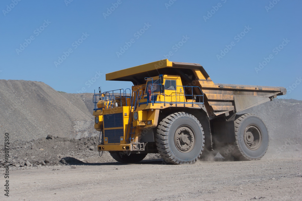 Coal mining. Yellow mining truck. Coal mining. Yellow mining truck.