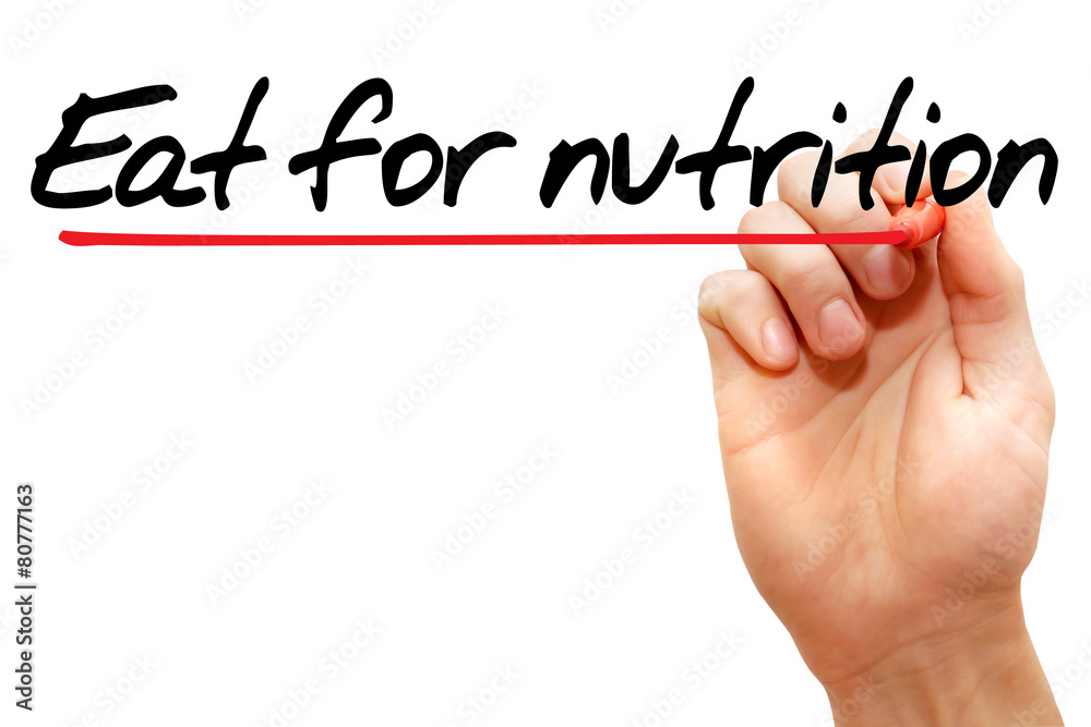 Hand writing Eat for nutrition with marker, health concept Hand writing Eat for nutrition with marker, health concept