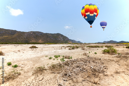 Hot air balloon with mountain background