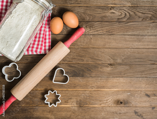 Flour, rolling pin, eggs and moulds