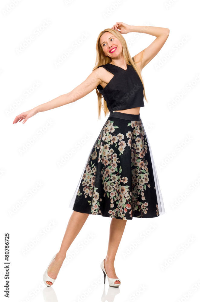 Woman in floral dark skirt isolated on white Woman in floral dark skirt isolated on white