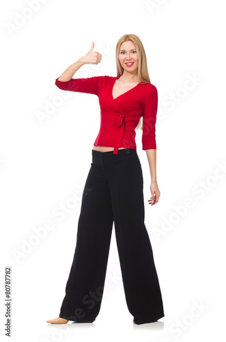 Young woman in flared pants isolated on white