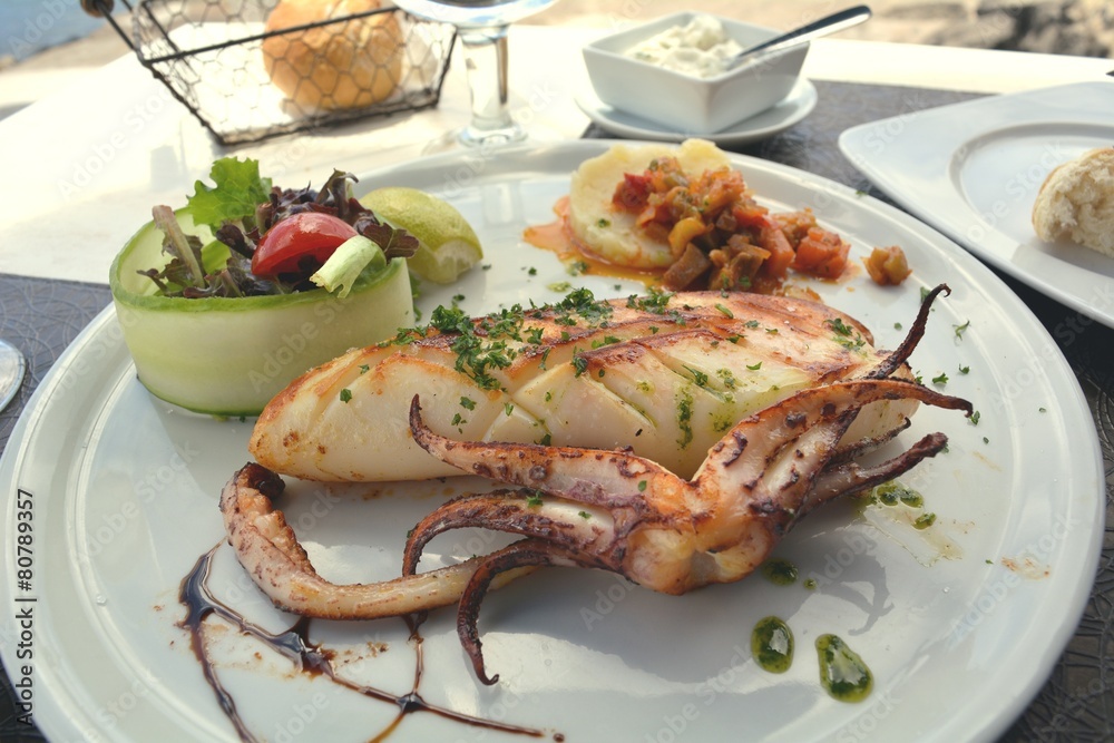 Macro Close up of grilled calamari and vegetables