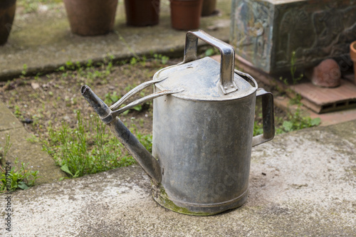 Old and rusty watering can