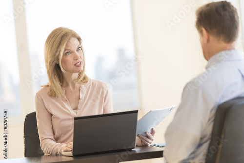 Businesswoman Taking Interview Of Male Candidate
