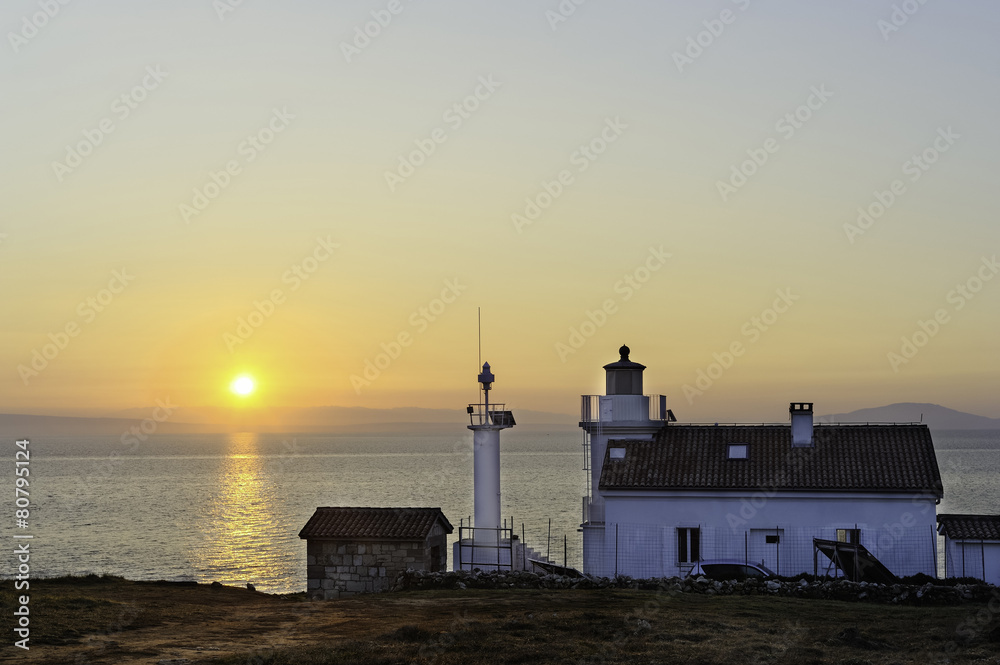 Fototapeta premium Sonnenaufgang beim Leuchtturm