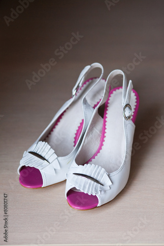 Summer womens fashion sandal on white wooden background