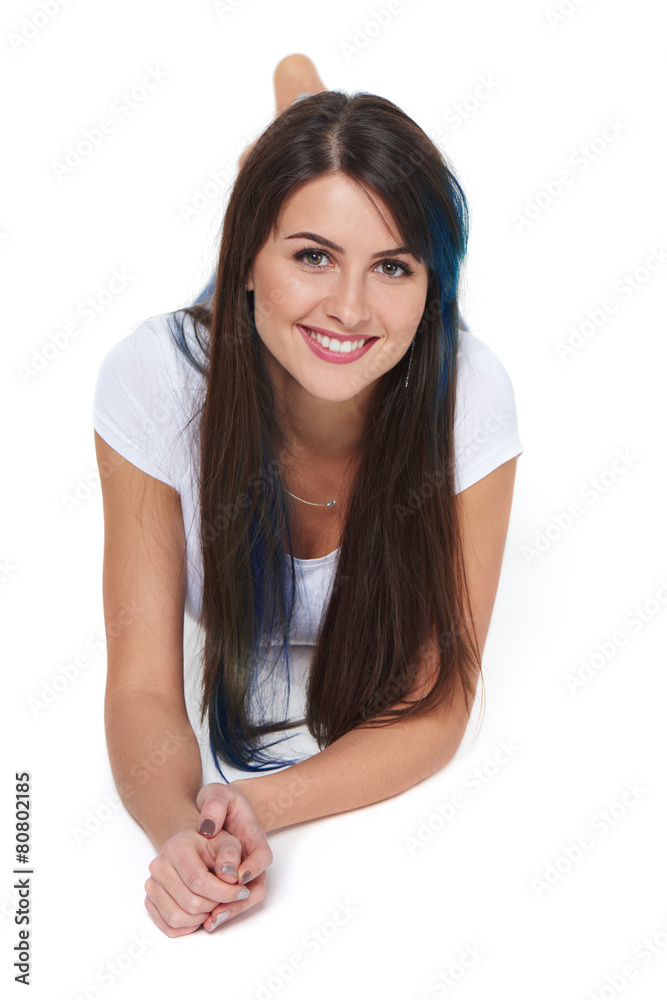 Smiling beautiful woman lying on the floor Smiling beautiful woman lying on the floor
