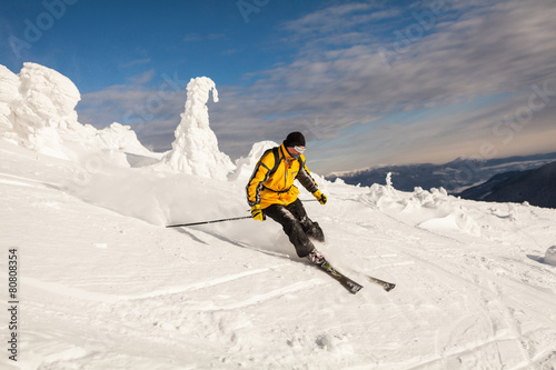 Man Snow Skiing Against Blue Sky