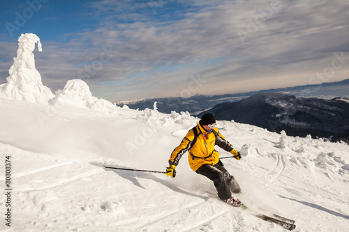 Man Snow Skiing Against Blue Sky