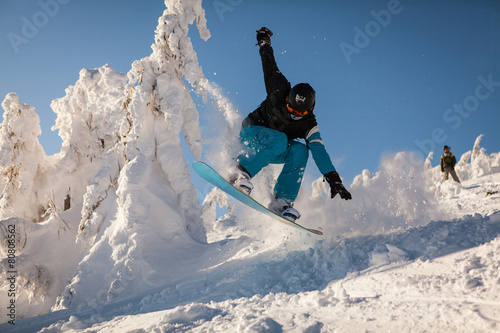 Snowboarder at jump
