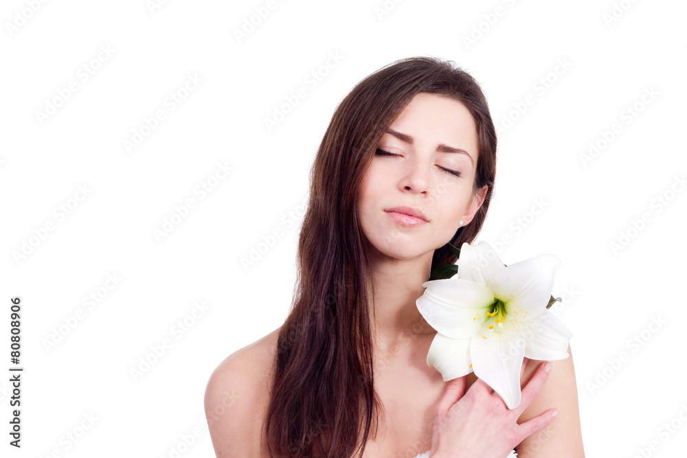 portrait of beautiful woman with perfect skin holding lily portrait of beautiful woman with perfect skin holding lily