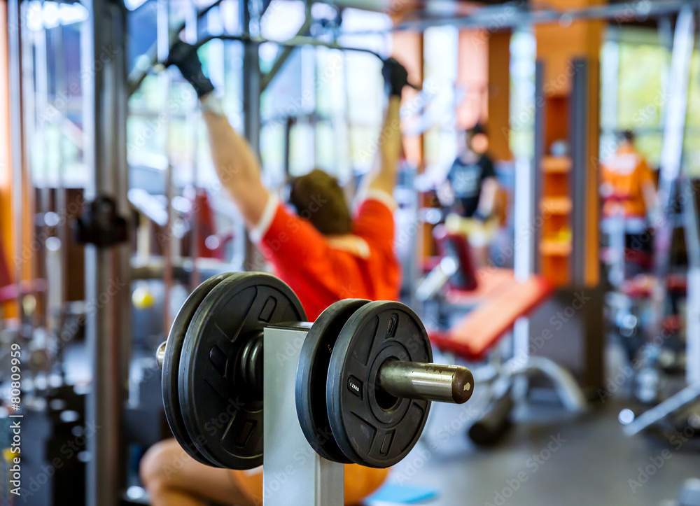 Fototapeta premium Barbell plates holder in gym