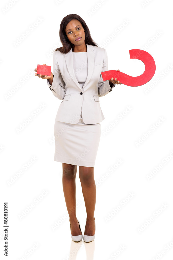 confused african american woman holding question mark confused african american woman holding question mark
