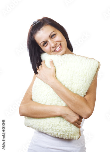 Young pretty woman with a pillow photo