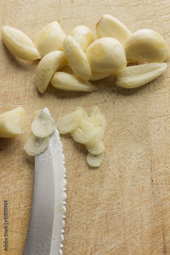 Slicing Fresh Pealed Garlic Cloves
