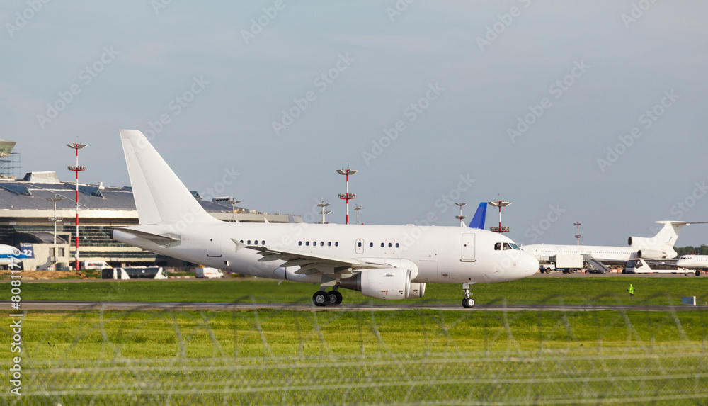 white plane takes off from the runway white plane takes off from the runway