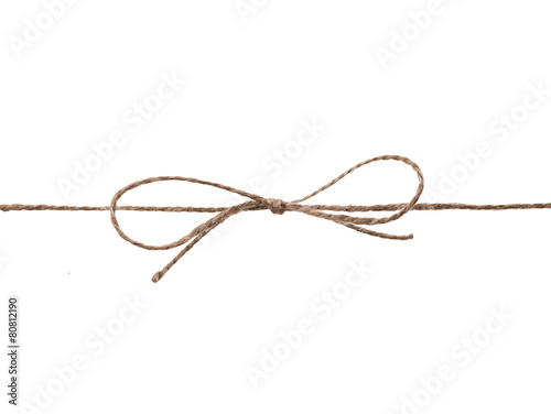 Rope and bow isolated on white background