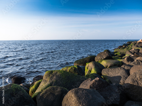 Bech and stone near the ocean