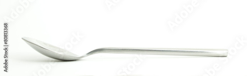Metal and wood spoon in profile