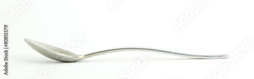 Metal and wood spoon in profile