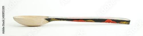 Metal and wood spoon in profile
