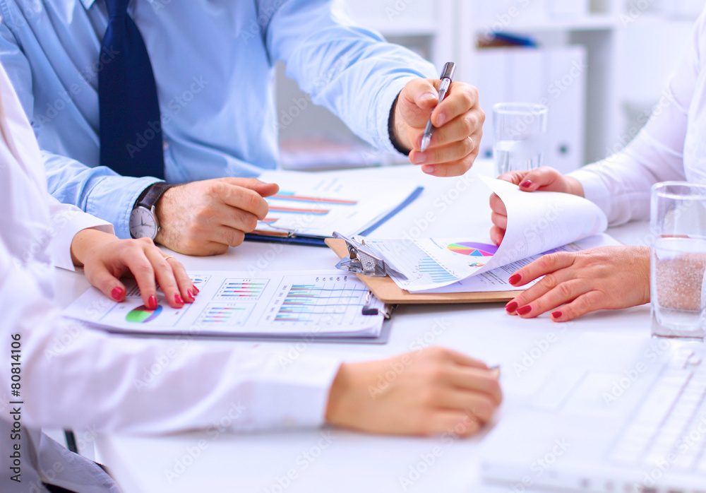 Group of business people working together in office Group of business people working together in office
