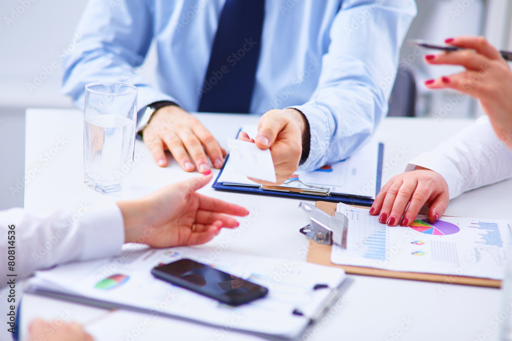 Group of business people working together in office Group of business people working together in office