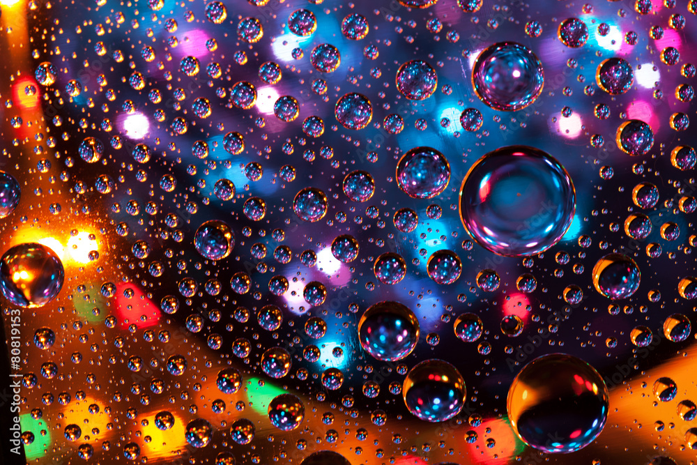Abstract background texture drops of water and art light on glas Abstract background texture drops of water and art light on glas