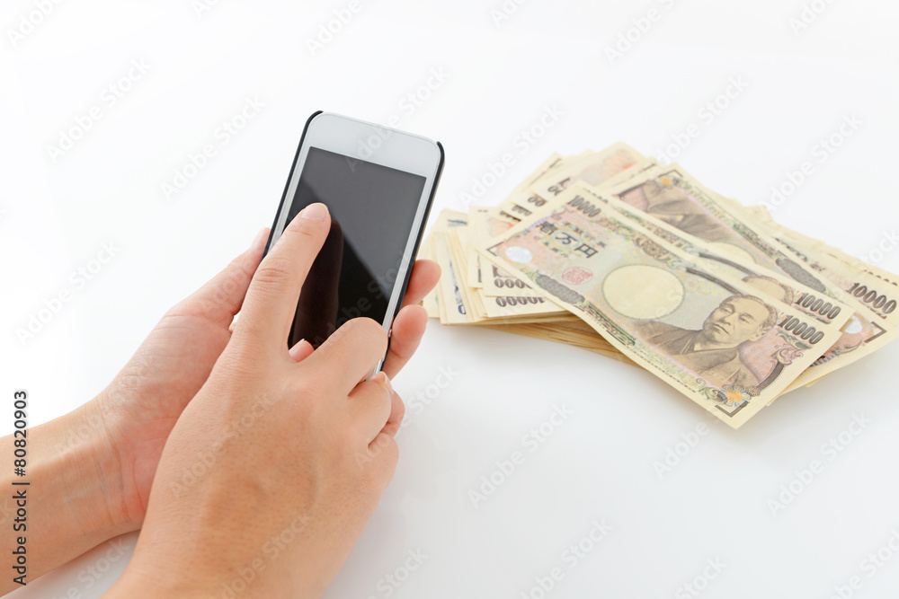 日本の紙幣とスマートフォン 日本の紙幣とスマートフォン