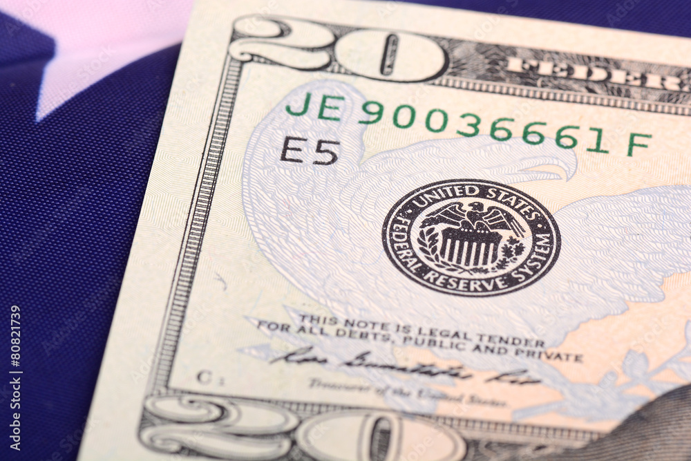 american dollars on american flag american dollars on american flag