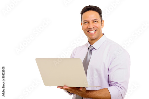 mid age man using laptop computer