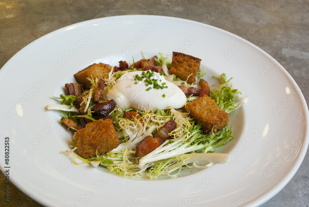Frisee Salad with Lardon, Poached Egg and Croutons Frisee Salad with Lardon, Poached Egg and Croutons