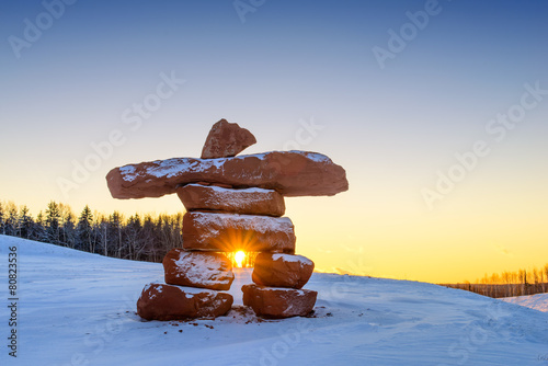 Inukshuk with setting sun