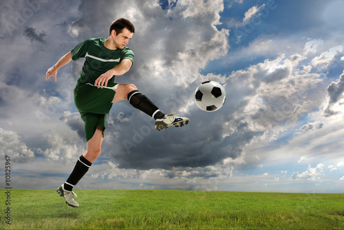 Soccer Player Kicking Ball Outdoors