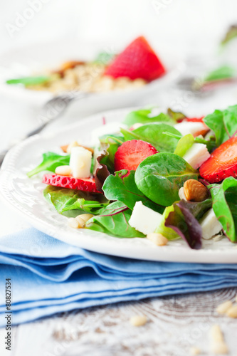 Spring salad with spinach leaves