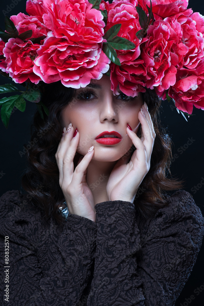Naklejka premium Beautiful girl with flowers in her hair. Spring.