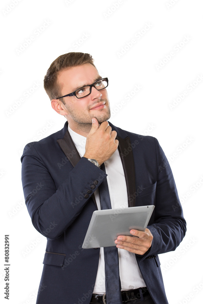 Young businessman with a tablet on his hand
