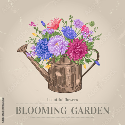 Flowers and  watering can.