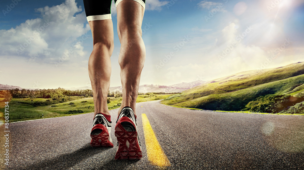 Sports background. Runner feet running on road closeup on shoe. - obrazy, fototapety, plakaty 