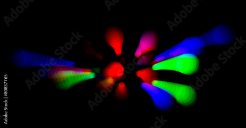 Colorful abstract background - out of focus party lights streaks